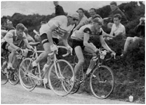 Fausto Coppi overtakes Syd Wilson, Manx Premier Pro Road Race, IOM, 1959 Fausto Coppi overtakes Syd Wilson, Manx Premier Pro Road Race, IOM, 1959